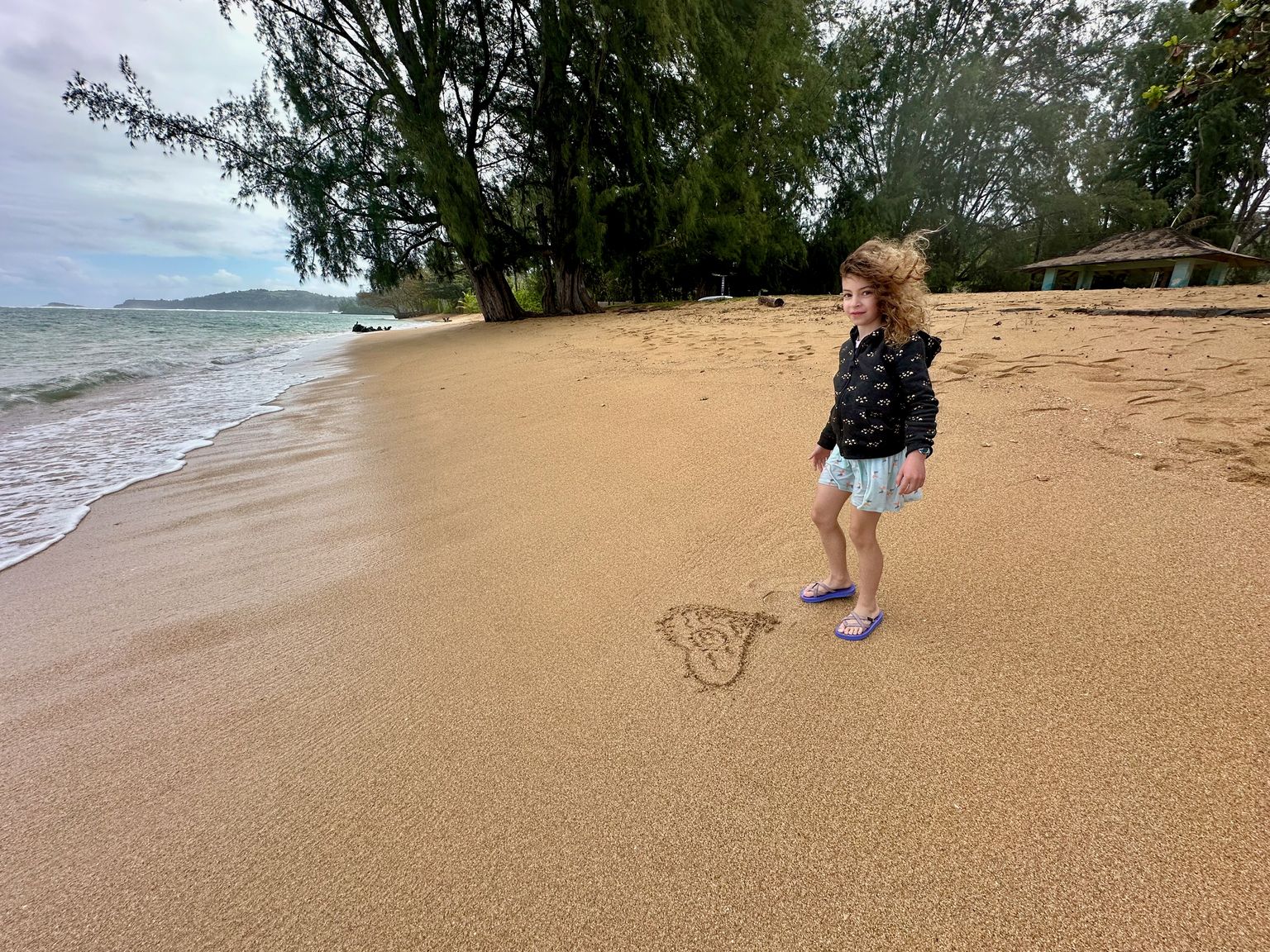 I'm sketching in the sand!